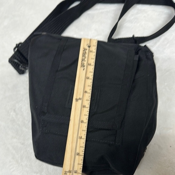 Compact Black Messenger Bag with Durable Fabric - Picture 7 of 11